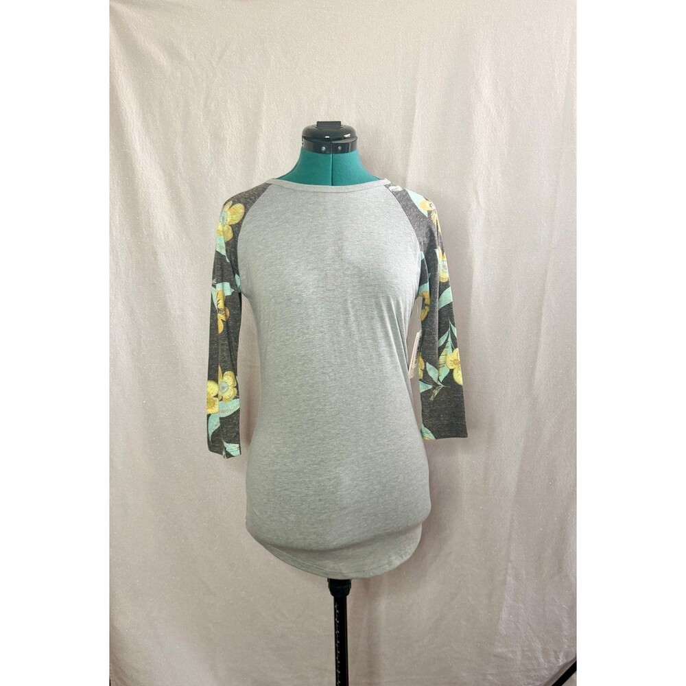 NWT Lularoe Randy top size extra extra small. Brand new with tags. Size XXS.